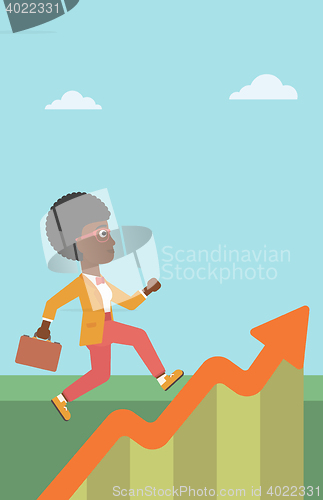 Image of Business woman running along the growth graph.