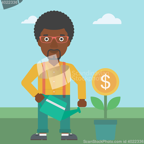 Image of Businessman watering money flower.