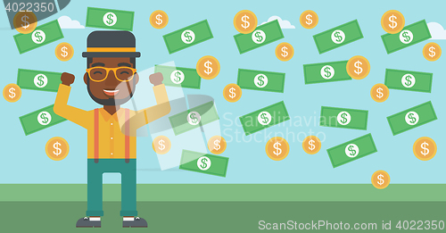 Image of Happy businessman under money rain.