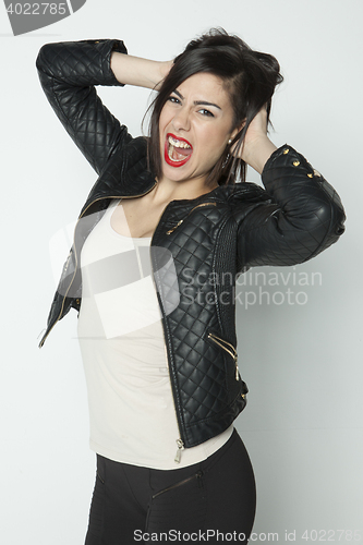 Image of natural brunete young woman posing in clear background