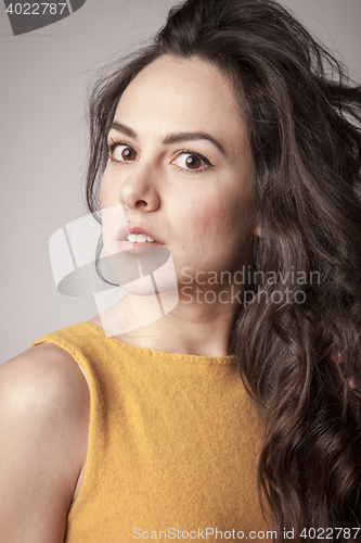Image of stylish young woman posing in clear background