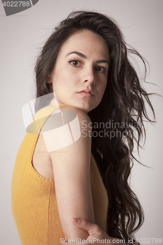 Image of stylish young woman posing in clear background