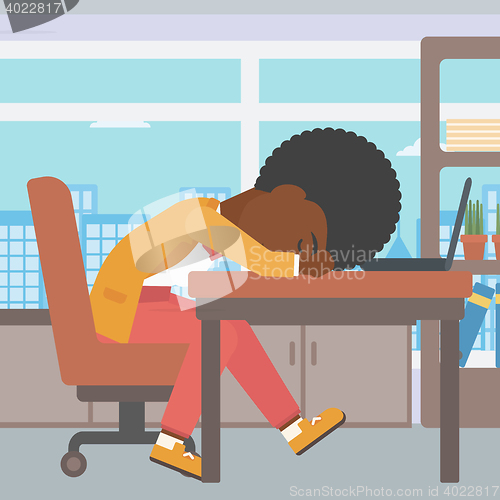Image of Woman sleeping on workplace.