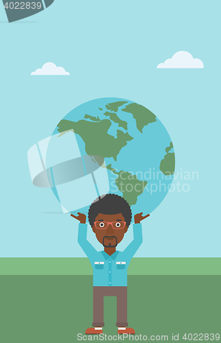 Image of Businessman holding Earth globe.