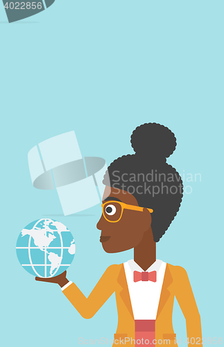 Image of Business woman holding Earth globe.