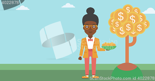 Image of Business woman catching dollar coins.