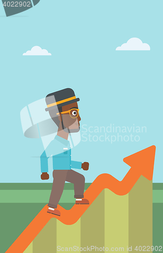 Image of Businessman running along the growth graph.