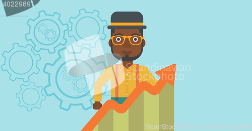 Image of Businessman with growing chart.
