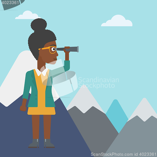 Image of Business woman looking through spyglass.