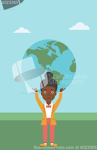 Image of Business woman holding Earth globe.