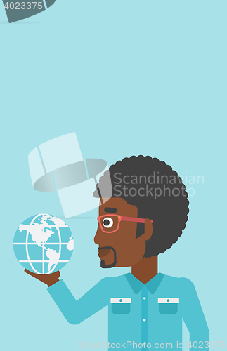 Image of Businessman holding Earth globe.