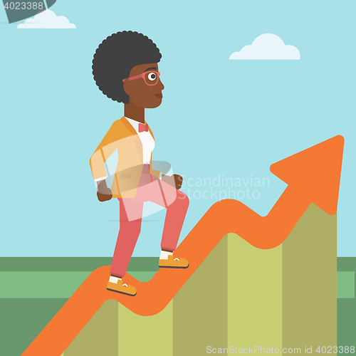 Image of Business woman running along the growth graph.