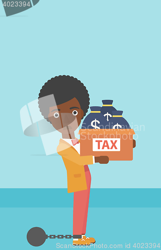 Image of Chained business woman with bags full of taxes.