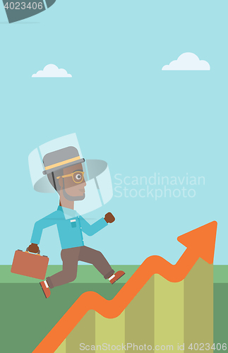 Image of Businessman running along the growth graph.