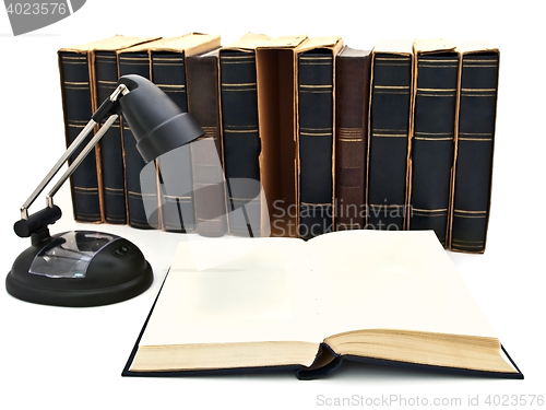 Image of Open Book And Lamp