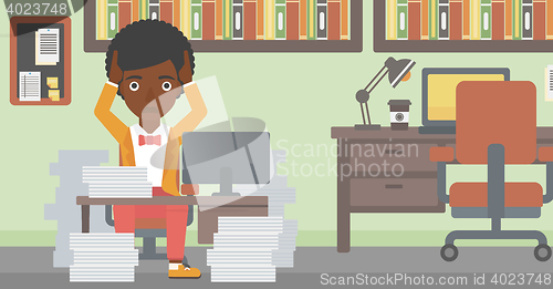 Image of Business woman in despair sitting in office.