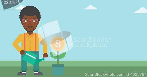 Image of Businessman watering money flower.