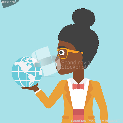 Image of Business woman holding Earth globe.