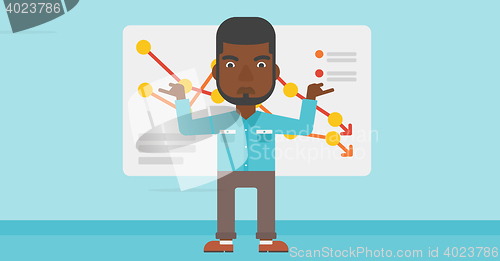 Image of Businessman with decreasing chart.