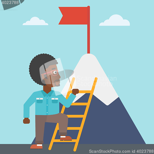 Image of Businessman climbing on mountain.