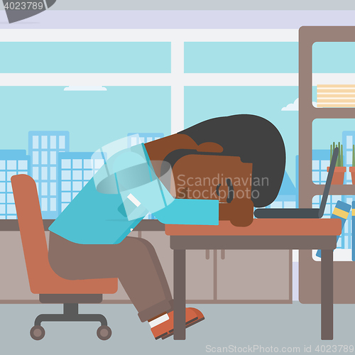 Image of Businessman sleeping on workplace.