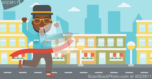 Image of Businessman crossing finish line.