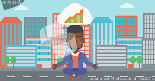 Image of Peaceful businessman doing yoga.