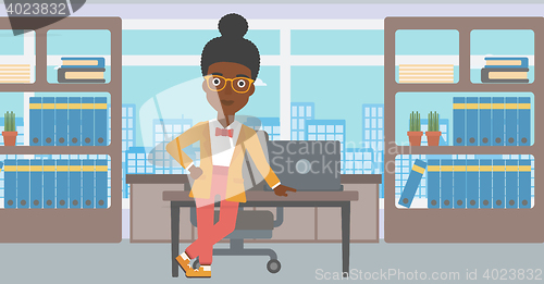 Image of Business woman standing in the office.