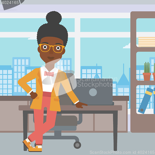 Image of Business woman standing in the office.