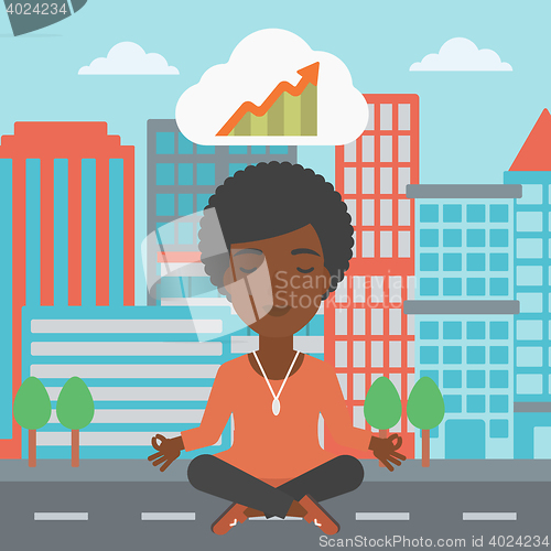 Image of Peaceful business woman doing yoga.