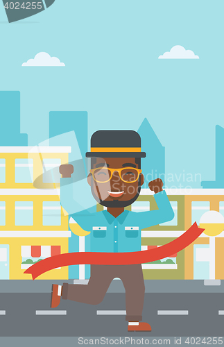 Image of Businessman crossing finish line.