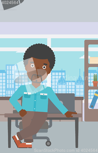 Image of Businessman standing in the office.