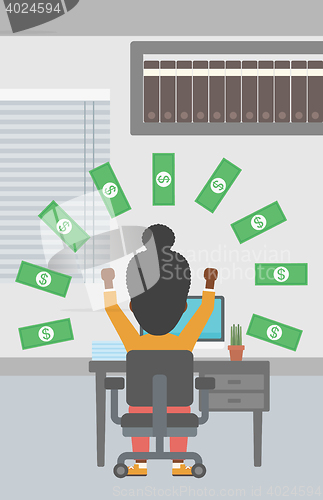 Image of Successful business woman under money rain.