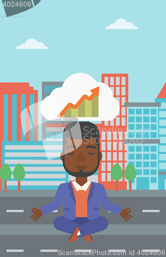Image of Peaceful businessman doing yoga.