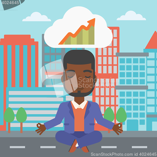 Image of Peaceful businessman doing yoga.