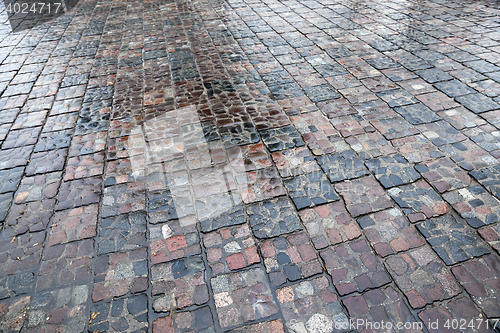 Image of stone road after rain