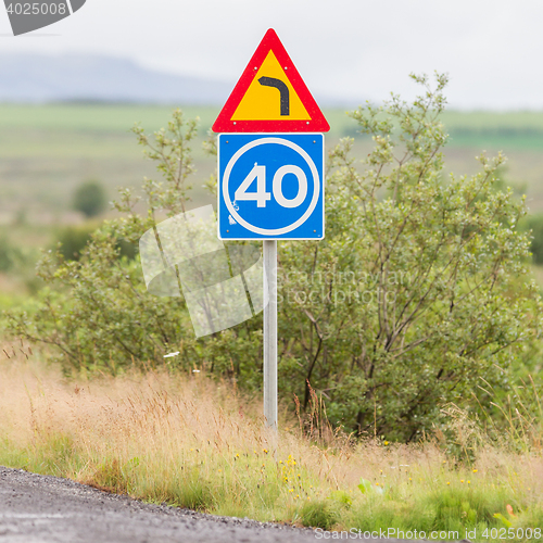 Image of Curve with advisory speed limit