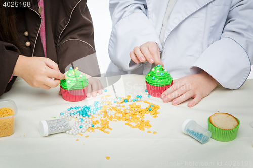 Image of Closeup of funny christmas cupcakes