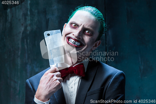 Image of Bloody Halloween theme: crazy joker face