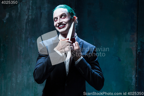 Image of Bloody Halloween theme: crazy joker face