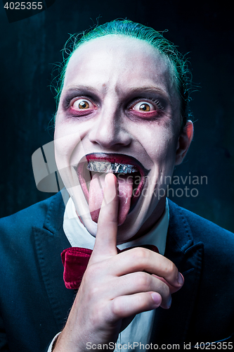 Image of Bloody Halloween theme: crazy joker face