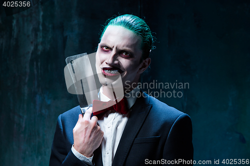 Image of Bloody Halloween theme: crazy joker face