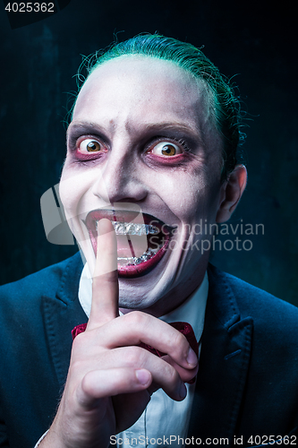 Image of Bloody Halloween theme: crazy joker face