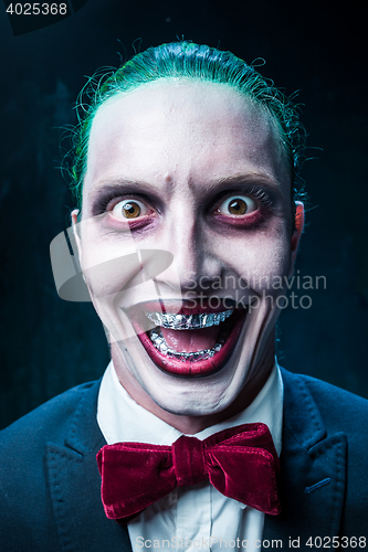 Image of Bloody Halloween theme: crazy joker face