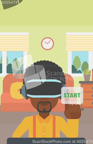 Image of Man wearing virtual reality headset.