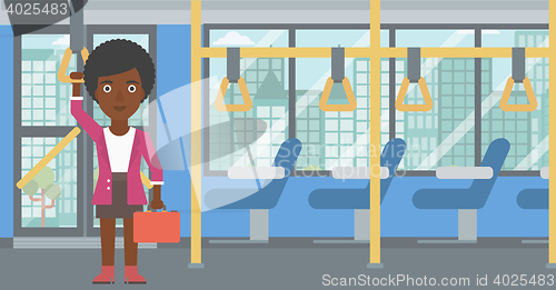 Image of Woman traveling by public transport.