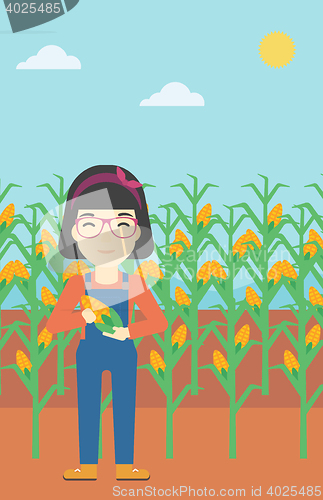 Image of Female farmer holding corn vector illustration.