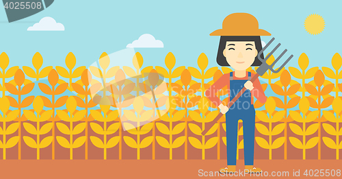 Image of Female farmer with pitchfork vector illustration.