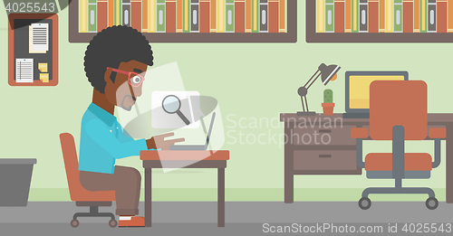 Image of Businessman working on his laptop.