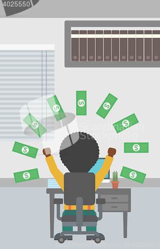 Image of Successful businessman under money rain.